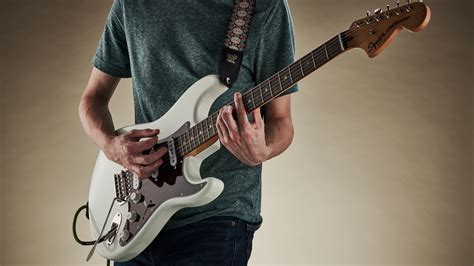 How to Play the Electric Guitar: A Symphony of Chaos and Coffee Stains